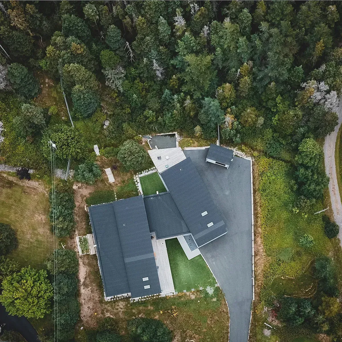 Aerial perspective of homes and tree-lined streets